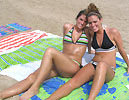 girls laying out on the beach